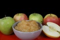 Handmade apple jam and fresh apples on black background Royalty Free Stock Photo