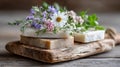 Handmade artisan soap bars arranged with herbal elements and flowers for natural wellness Royalty Free Stock Photo