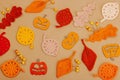 Handmade autumn background. Set of different fall knitted and crocheted fall leaves and wooden pumpkins Royalty Free Stock Photo