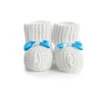 Handmade baby booties with bows on white Royalty Free Stock Photo