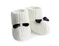 Handmade baby booties with bows on white Royalty Free Stock Photo