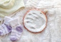 Handmade baby hand print inside clay for memory. White handprint on white dress.