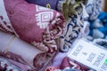 Handmade beach and bath towels on the counter in the market