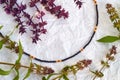 Handmade beadwork, beading as a hobby. Decorations made with your own hands on the background of various flowers