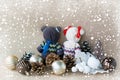 Handmade bears made of towels and handmade white apples near toys for a Christmas tree and pine cones with snowflakes effect