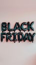 Handmade BLACK FRIDAY text in metallic gradient on neutral background Royalty Free Stock Photo