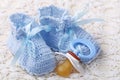 Handmade blue baby booties