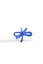 Handmade blue string knot tied on white letter roll isolated Royalty Free Stock Photo