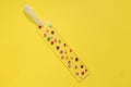 Handmade bookmark isolated on yellow background