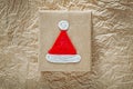 Handmade boxed Christmas gift on wrapping paper holidays concept