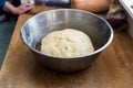 Handmade bread dough rising in a bowl Royalty Free Stock Photo