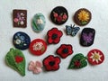 Handmade brooches embroidered with spring flowers, butterflies and leaves