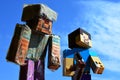 Handmade cardboard and duct tape Steve from Minecraft sunbathe with large LEGO Steve action figur