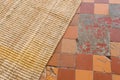 Handmade carpet on tiled checkered floor, carpet on the floor Royalty Free Stock Photo