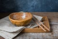 Handmade ceramic bowl on a wooden background, wabi sabi style