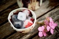 Handmade ceramics. Ice cubes, frozen berries, on wooden background.Freshness, rustic