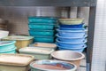 Handmade ceramics stacked on shelves, showcasing earthy tones with subtle textures Rustic yet refined appearance Royalty Free Stock Photo