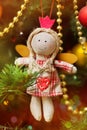 Handmade Christmas angel on fir-tree Royalty Free Stock Photo