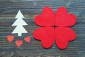 Handmade Christmas decorations from paper and felt on dark wooden background. Flat lay Royalty Free Stock Photo