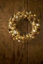 Handmade Christmas elegant wreath on a wooden background Royalty Free Stock Photo