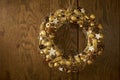 Handmade Christmas elegant wreath on a wooden background Royalty Free Stock Photo