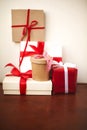 Handmade Christmas presents wrapped in paper with red and white