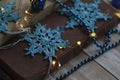 Handmade Christmas tree decoration, blue snowflake crocheted. Royalty Free Stock Photo