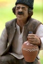 Handmade clay figurine of a Romanian peasant