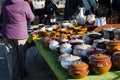 Handmade clay varnish pots with lids at rural fair