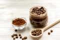 Handmade coffee-cocoa scrub on wooden background
