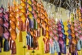 Handmade colored candles hung to dry