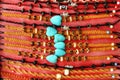 Handmade colorful bracelets decorated wooden beads, blue stones and metal fittings. Royalty Free Stock Photo