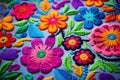 Handmade colorful flower embroidery on fabric background. Close up, ÃÂolorful embroidered decorative textile from Royalty Free Stock Photo