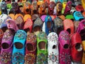Handmade colourful babouche - leather slippers on display at traditional souk - street market in Morocco Royalty Free Stock Photo