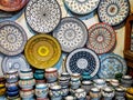 Handmade colourful decorated bowls or cups on display at traditional souk - street market in Morocco Royalty Free Stock Photo