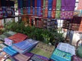 Handmade cotton and silk materials at open air market, Luang Prabang, Laos Royalty Free Stock Photo