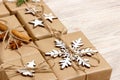 Handmade craft christmas gifts or new year rustic presents gifts on wooden background