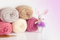 Handmade crochet doll. Cute rabbit doll on white background.