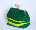 Handmade crochet purse with cotton thread in green and yellow co Royalty Free Stock Photo