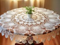 handmade crochet white lace tablecloth on living room table