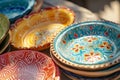 Handmade decorative ceramic tableware. Colorful empty craft ceramic plates. Generative AI