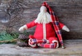 Handmade doll Santa Claus sitting in the Lotus position