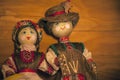 Handmade doll wooden background