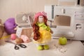 Handmade doll in workplace Royalty Free Stock Photo