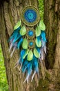 Handmade dream catcher with feathers threads and beads rope hanging Royalty Free Stock Photo