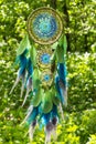 Handmade dream catcher with feathers threads and beads rope hanging Royalty Free Stock Photo