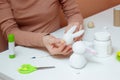 Handmade Easter decoration cute little rabbit. Making cute bunny toy DIY for kids. Spring home activities