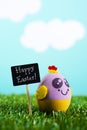 Text happy easter and handmade easter egg Royalty Free Stock Photo