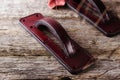 Handmade exclusive red leather door handles in the shape of the handle of a vintage suitcase Royalty Free Stock Photo