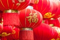 Handmade Fabric red lanterns with Chinese blessing Fu on hanging for Chinese new year in a chinatown.